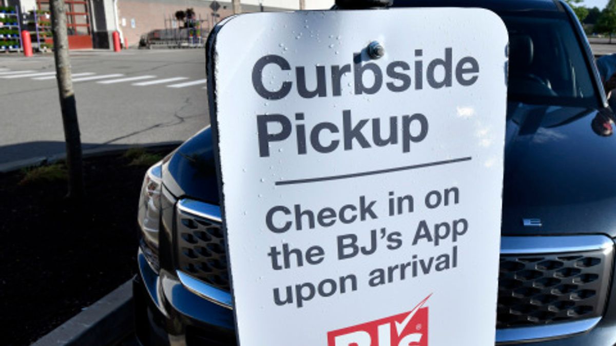 Curbside pickup sign outside BJ's Wholesale Club location