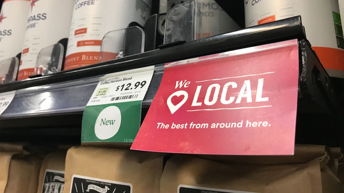Local shelf tag in the coffee section at a Whole Foods in Silver Spring, Maryland.